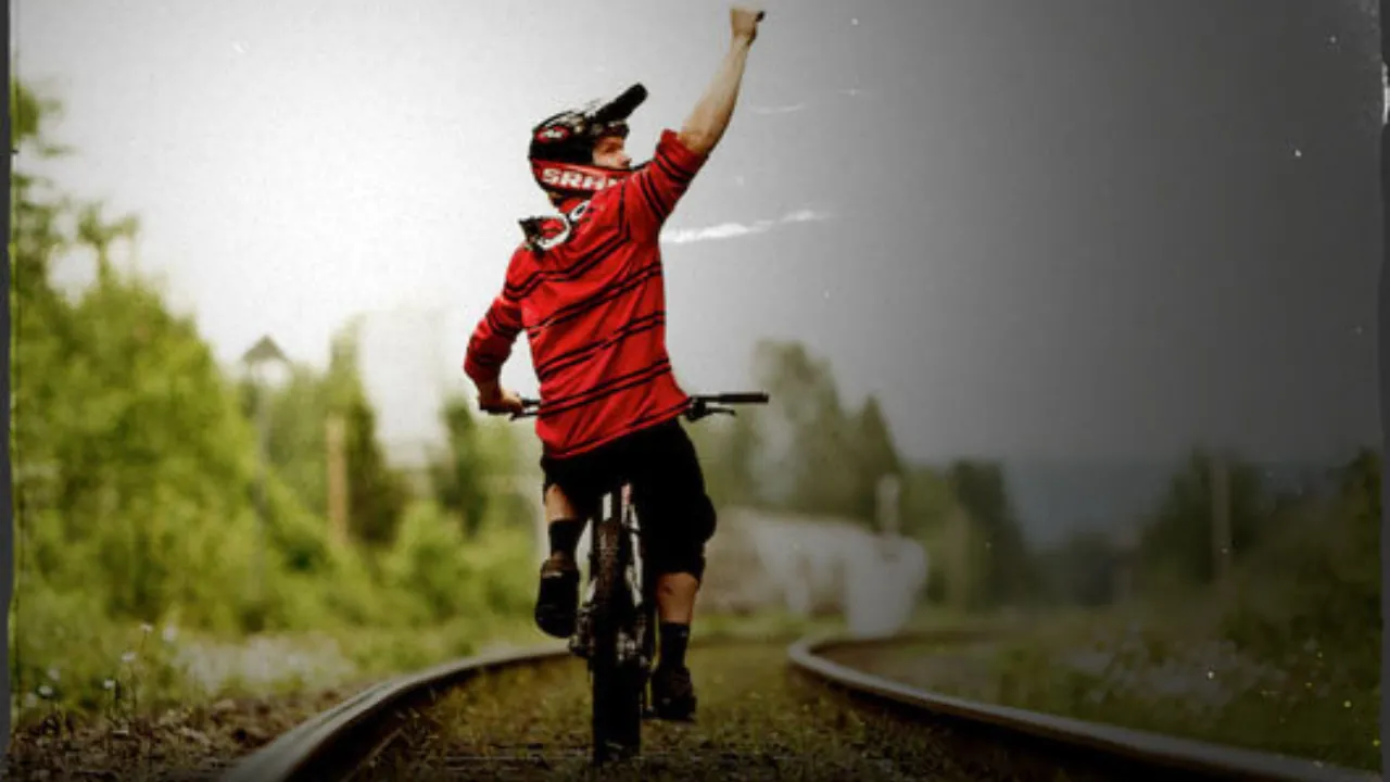 Pro mountain biker Kyle Norbraten celebrates clearing the infamous train gap.
