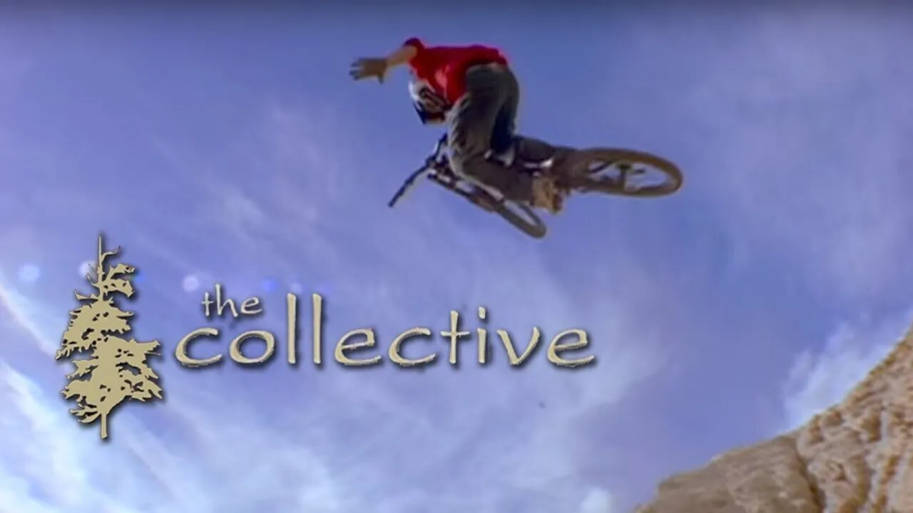 Collective hero image: a mountain biker flies off a lip into the clear blue sky.