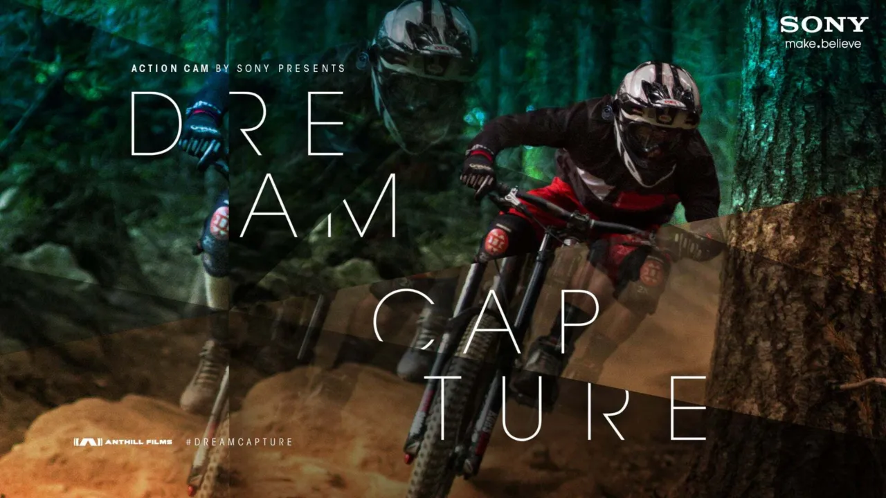 Poster image shows  self-described "bike bum" Adam Billinghurst descending in layers for his Dream Capture film: One Million Down.