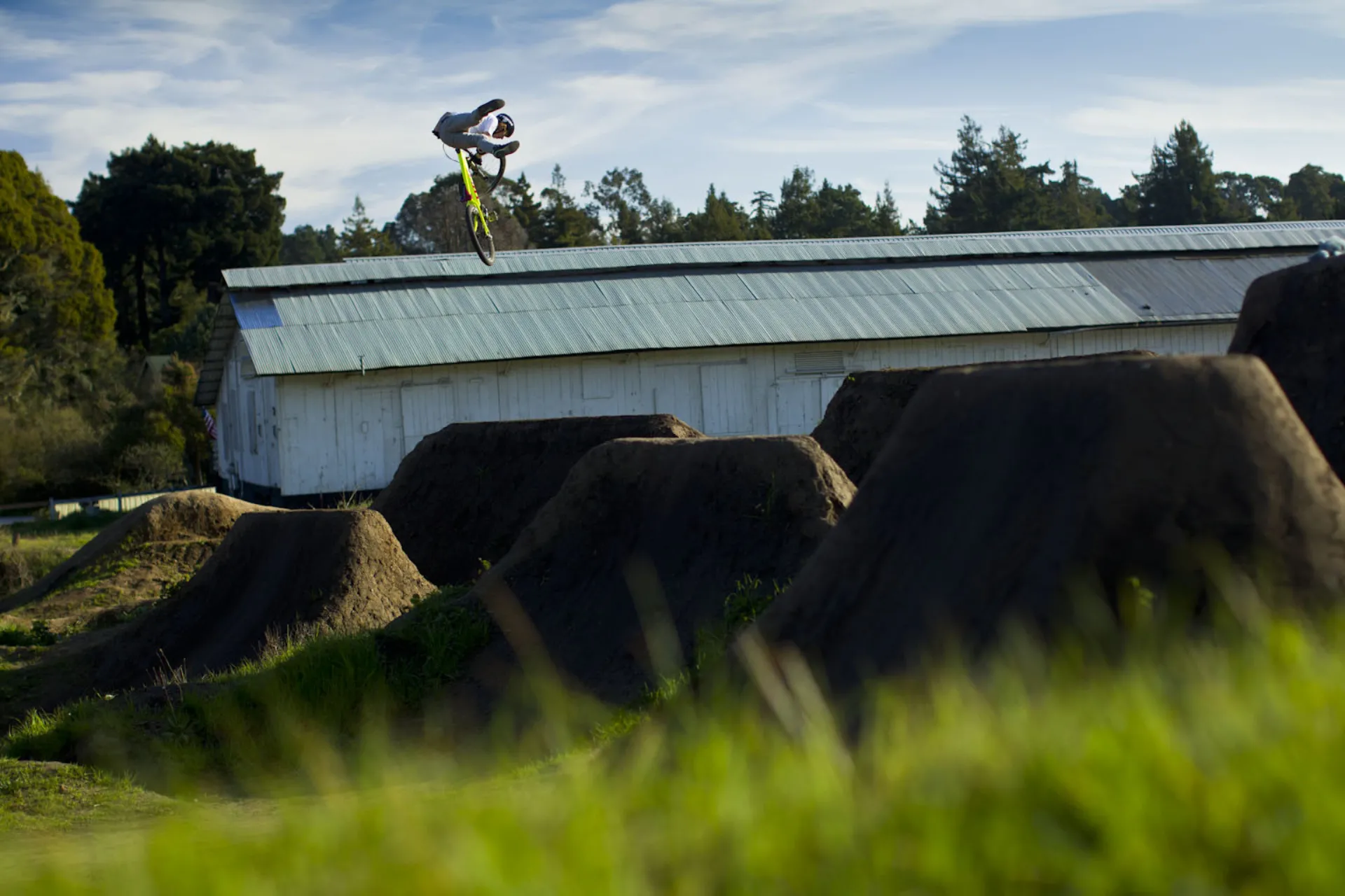 Brett Rheeder performs a no-foot can air during the filming of Anthill's mountain bike film "Strength In Numbers", March 2012.